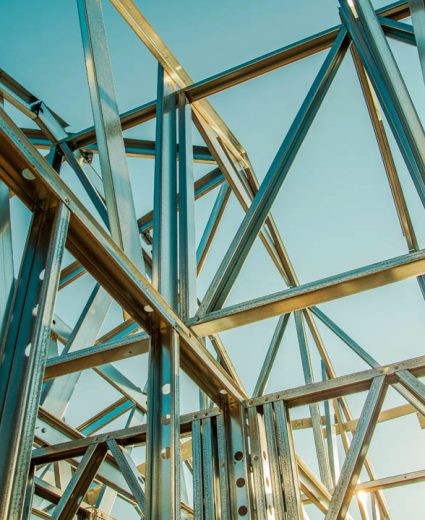 Building Steel Skeleton Frame at Sunset. Modern Building Structure Technologies.