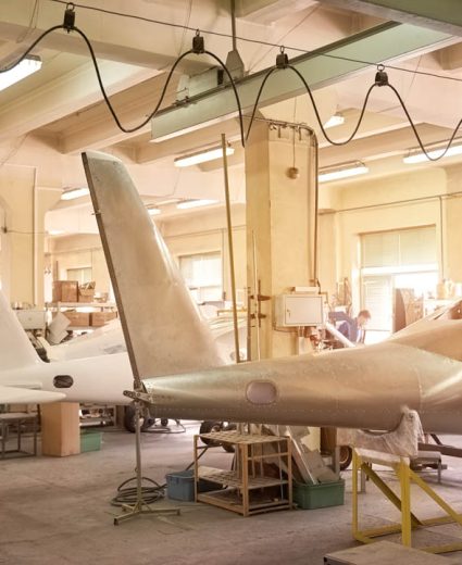13.12.2016 - Kiev, Ukraine. Inside aircraft workshop. Tails of airplanes. Aviation industry development.